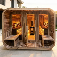 Sauna extérieur à bois avec cabines individuelles, foyer central, véranda en bois, pour projets hôteliers et collectivités