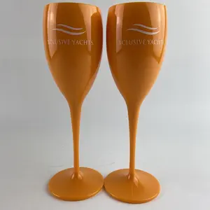 pink/orange colored plastic party wedding champagne flutes glasses