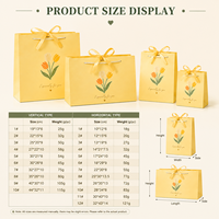 Sac en papier blanc personnalisé OEM avec logo imprimé offset, gaufrage, estampage à chaud et service d'emballage haut de gamme