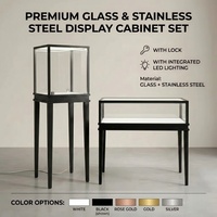 Meilleures ventes : Ensemble de vitrines en verre en acier inoxydable noir, comptoir de présentation de bijoux pour boutiques de luxe, étagère sur piédestal éclairée par LED