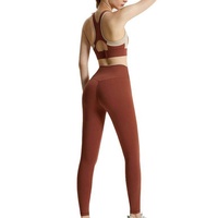 Ensemble de leggings et soutien-gorge de sport deux pièces respirant de haute qualité avec logo personnalisé OEM pour femmes, idéal pour le yoga et la gym, couleur unie