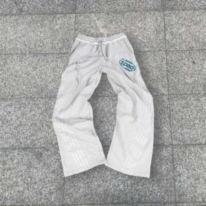 กางเกงวอร์มผ้าคอตตอนสำหรับผู้ชายกางเกงทรงหลวมลายทางด้านข้างเอวสูงปักโลโก้ได้ตามต้องการ - Product Image 1