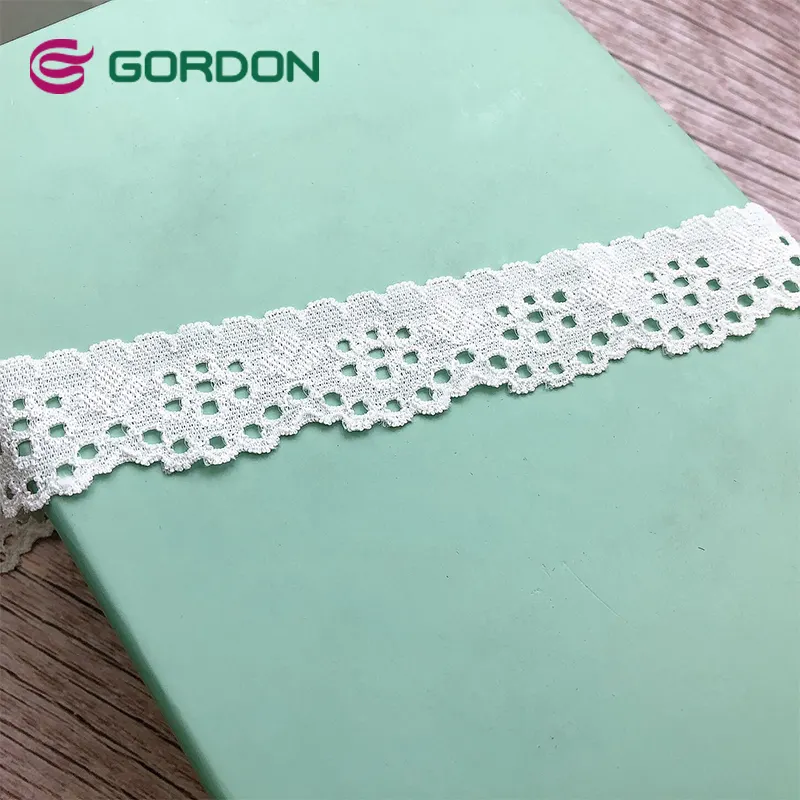 Nastro di pizzo elastico rifiniture intimo ricamato per la decorazione del cucito tessuto di pizzo africano fiore bianco di alta qualità 3-5 giorni