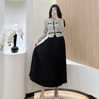 Nouvelle robe plissée rétro de style Miyake, à l'aspect deux pièces, avec une grande ampleur, une taille élégante et une coupe ajustée