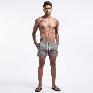 Haute qualité hommes couleur unie séchage rapide vêtements de plage décontractés moyen pantalons chauds natation Surf Board ShortsDDP expédition - Product Image 1