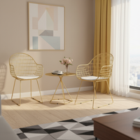 Chaise de salle à manger de luxe en fil métallique doré avec coussin en cuir PU blanc |   Conception de cage ouverte écologique pour salon commercial