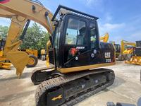Excavatrice CAT 312D d'occasion en excellent état, faible usage, capacité de godet de 0,52 m³, moteur puissant de 72 kW, vente flash