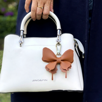 Porte-clés papillon en cuir PU double couche coloré et tendance avec fermoir métallique, cadeau promotionnel, breloques pour sacs femme