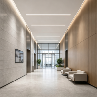 Intérieur de bureau moderne avec bureaux linéaires pour équipes, îlot de réunion, espace de gestion, espace de travail en îlot et zone sociale décontractée