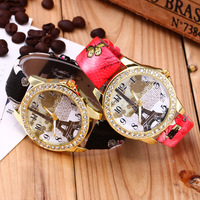 Montre analogique à quartz pour femme, style vintage, tour Eiffel de Paris, avec fleur, boîtier en alliage, verre en cristal et bracelet en cuir