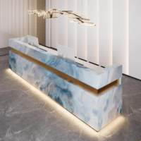 Comptoir de réception moderne en marbre personnalisé pour hôtel et salon