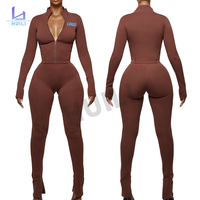 Huili personnalisé de haute qualité deux pièces fermeture éclair haut court et Leggings pantalon de jogging survêtement maigre Gym 2 ensembles tenues pour les femmes