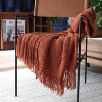 Großhandel Nordische Feder-Garn-Strickdecke mit Quasten, Weiche Geometrische Ganzjahres-Sofa-Bett-Luxusdecke