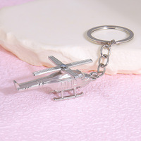 Porte-clés hélicoptère rétro - Breloque avion en métal multicolore, accessoire de sac à dos pour les amateurs d'aviation