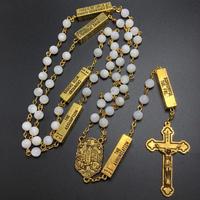 Collier religieux élégant en coquillage et nacre, avec centre Fatima, connecteur Cinq Mystères et métaux dorés antiques