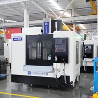 Centre d'usinage vertical haute précision VMC855, structure rigide BT40, performances stables, taille de table 1000x550 pour pièces métalliques