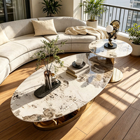 Table basse ovale de luxe moderne en marbre avec base sphérique en acier inoxydable, table de salon design pour villa et appartement