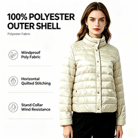 Veste matelassée à col montant pour femme, fermeture à boutons-pression, finition brillante légère, style urbain chic, manteau d'hiver décontracté pour femme, tenue quotidienne en ville