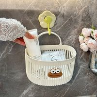 Petit panier de rangement suspendu en plastique, fabriqué à Yiwu, pour salle de bain, cuisine, dortoir, chevet, mural, design moderne et simple, fonctionnel