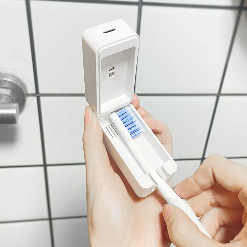 Mini spazzolino da denti detergente UV portaspazzolino disinfettante portatile per spazzolino con Design a batteria