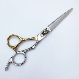 Tijeras de peluquería GT6 de 6.0 pulgadas, doradas, con tornillo de cabeza de toro, para entresacar, para diestros, uso estético, hoja estándar - Product Image 1