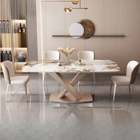 Table à manger rectangulaire avec plateau en pierre frittée et base en métal en forme de X, style élégant pour hôtel, restaurant, villa, salle de banquet