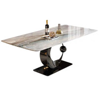 Table à manger rectangulaire de luxe en pierre de cristal italienne minimaliste avec 6 chaises pour petit appartement et salon moderne