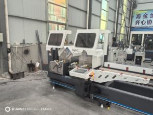 เลื่อยตัดซีเอ็นซีแบบสองหัวรุ่นใหม่ปี 2026 ของโรงงานฮิเซนะ สำหรับตัดโปรไฟล์ประตูและหน้าต่างอลูมิเนียม ความแม่นยำสูง 380V 6.8kW - Product Image 4