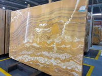 Carrelage mural de luxe en pierre bleue translucide d'onyx jaune