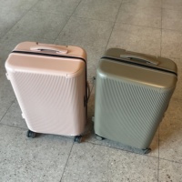 Valise trolley haut de gamme tendance à roulettes pivotantes unisexe en PC rigide ultra-légère avec fermeture éclair et cadenas, bagage cabine