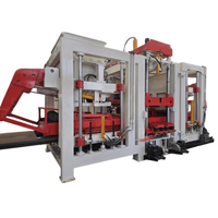 Machine de fabrication de blocs creux en béton entièrement automatique contrôlée par PLC QT18-15 avec pompe, boîte de vitesses, moteur et moteur électrique