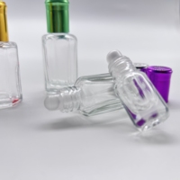 Gran cantidad de botella de vidrio de perfume Octágono transparente de 2ml ~ 20ml con rodillo para tapa de bola y sello de tornillo bien recibido por