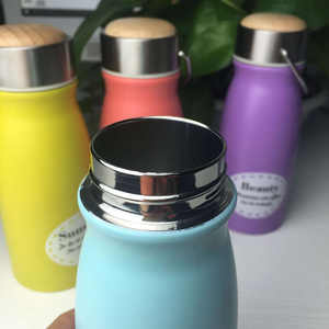 Tasse isotherme moderne en acier inoxydable à double paroi avec couvercle en bois, isolation thermique de 6 à 12 heures, écologique et anti-fuite - Product Image 6