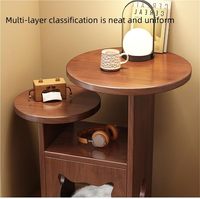 Table de chevet ronde moderne en bois massif marron avec espace caché pour chat, double fonction : table d'appoint et table de chevet pour les coins de la maison.