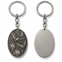 Porte-clés en métal ovale personnalisé avec motif floral et oiseau, logo sur mesure, vente en gros, cadeau d'entreprise, fabricant OEM en gros
