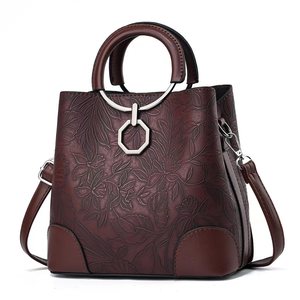 Sacs à main pour femmes en cuir PU brillant de haute qualité, à bandoulière, avec pendentif fleur, vente en gros - Product Image 2