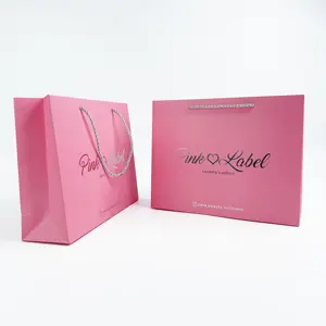 Hot Sale Custom mit Logo Luxus europäische Boutique Kleidung rosa Kunst papier Geschenk Shopping Papiertüte mit Griff