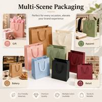Sac en papier de luxe personnalisé avec ruban, finition colorée et poignée stratifiée brillante, poignée avec impression artistique et soufflet latéral, pour cadeaux et fêtes