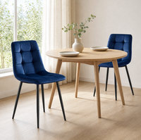 Chaise de salle à manger contemporaine en velours coloré, avec structure en métal, confortable pour la maison, la salle à manger ou l'appartement.