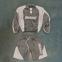 Ensemble de survêtement décontracté pour homme, coupe courte, léger, coupe-vent, demi-zip, color block, style vintage urbain, idéal pour l'été, personnalisable en usine