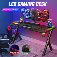 Smart Gaming Desk with Wireless Charging Pad, USB Ports and Power Outlets, RGB LED Strip Lighting, Ergonomic PC Gaming Table