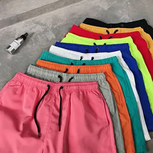 Shorts de banho masculinos plus size com logotipo personalizado de fábrica, calção de banho solto respirável e fino de cor sólida para homens, calção de banho para homens, cor sólida e solta