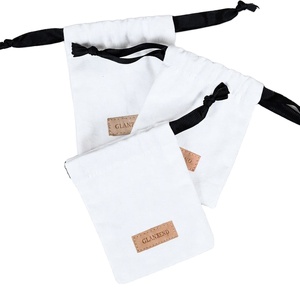 Small White Canvas Drawstring Bag Personalized Cotton Muslin Jewelry Pouch with Custom Embossed Leather Label Patch - Product Image 1