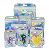 Petites pochettes zippées en mylar holographique transparentes arc-en-ciel avec dos argenté