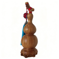 Sculpture artisanale en bois de calebasse symbolisant la chance, l'harmonie et la prospérité pour une décoration élégante de la maison et du bureau