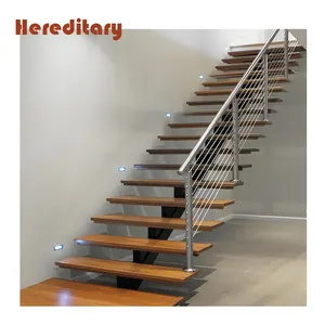 Escaleras de larguero de madera mono interiores modernas con barandillas de acero inoxidable y diseño de peldaño de madera de roble