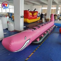 Bateau gonflable de type requin à 8 places en PVC robuste, à tube unique, avec logo et couleur personnalisés, pour activités de groupe en parc aquatique.