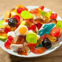 Fabricants chinois de bonbons OEM, vente en gros de bonbons gélifiés moelleux, acidulés et sucrés, aux saveurs de fruits assorties, en forme d'anneaux, d'ours et de vers