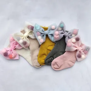 Chaussettes d'hiver en coton pour bébés filles, avec grand nœud papillon, pompons colorés, vente en gros pour enfants