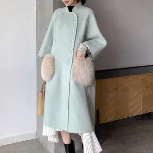 最高品質の本物のキツネの毛皮のポケットウールの布の女性100% オーストラリアの女の子のためのウールのオーバーコート長い冬の女性のウールのコート